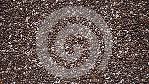 Chia seeds on rotation background. Healthy food, super seeds texture. Food ingredient background. Top view, healthy