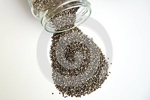 Chia seeds from the Salvia hispanica plant. Very healthy functional food to use in various recipes.