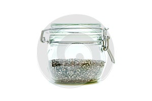 Chia seeds stored inside the closable glass bottle