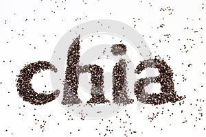 Chia word made from chia seeds Salvia hispanica on white background.