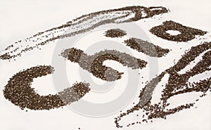Chia word made from chia seeds on white background