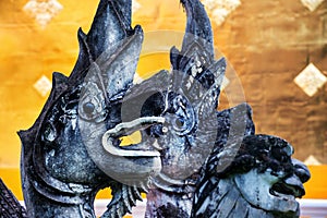 Chiang Mai, Thailand. Dragon head sculptures of Phra Singh temple