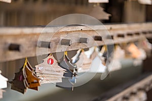 Chiang Rai, Thailand - January, 11, 2021 :  12 zodiac wooden planks in the shape of a house donation Label in Cherntawan