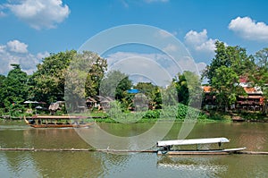 Chiangmai The oldcity, beautiful Ping river under blue sky and clouds.