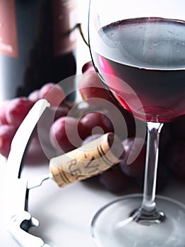 Chianti reserve red wine, glass, grapes