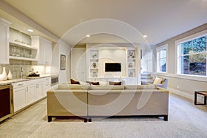 Chic basement living room with wet bar