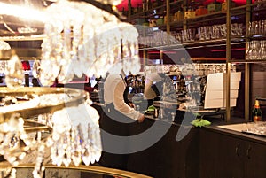 Chic classic crystal chandelier in the interior of a cafe, restaurant