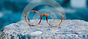 Chic and fashionable eyeglasses elegantly placed on the lively city street pavement