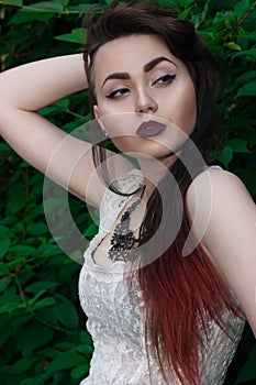 A chic girl in a lace blouse