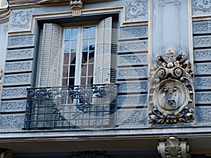 Chic vintage balcony with elegant details in the centre of Madrid, Spain. Spanish classical architecture downtown in Chueca photo