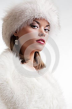 Chic woman in white furs