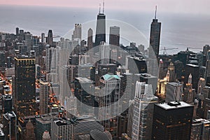 Chicago aerial skyline during sunset. Taken from above at Skydeck Willis Tower. Lake Michigan in sight