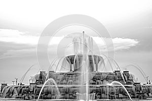 Chicago Buckingham fountain in Grant Park in the morning with cloud and blue sky.