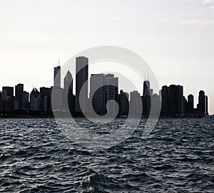 Chicago city downtown urban skyline at dusk with skyscrapers over Lake Michigan .Night view Chicago.