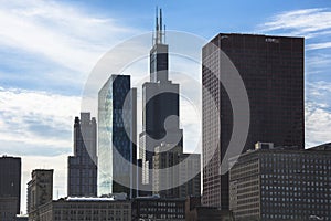 Chicago downtown cityscape with skyscrapers, aerial or bird-eyes view, cloudy day.