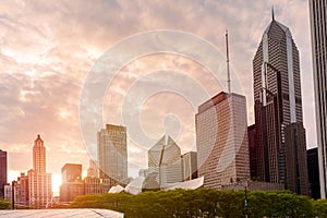 Chicago downtown skyline under dramatic sky at sunset