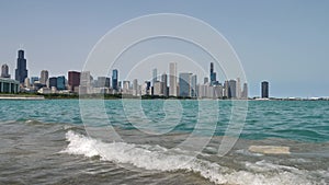 Chicago Downtown Waterfront and Skyline. Slowmotion View From Boardwalk on Michigan Lake on Summer Day