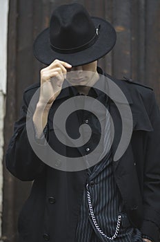 Chicago gangster in a vintage suit and hat