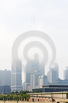 CHICAGO, IL - August 2014: John Hancock Building and cloud below in Chicago Skyline, Chicago, Illinois. It was constructed in