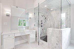 A large luxury bathroom with a walk-in shower.