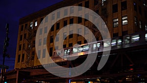 Chicago loop train passing by downtown apartment photo