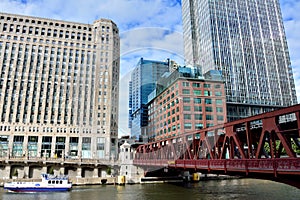 Chicago Merchandise Mart and city buildings beside Chicago river