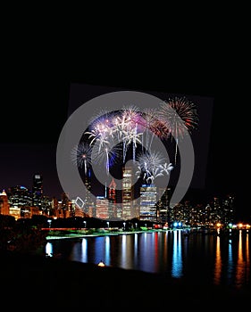 Chicago night skyline with fireworks, Usa.