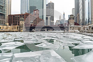 Chicago river downtown frozen ice buildings bridge