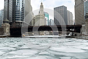 Chicago river downtown frozen ice buildings bridge