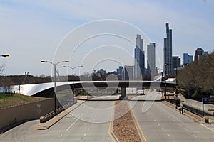 Chicago`s Lake Shore Drive is empty at BP Pedestrian Bridge during pandemic stay at home order