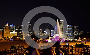 Chicago skyline and Buckingham Fountain at night.