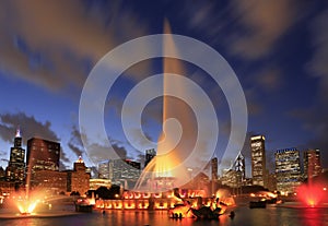 Chicago skyline at dusk with Buckingham fountain on the foreground