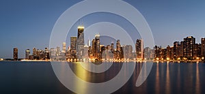 Chicago skyline panorama at night viewed from North Avenue Beach