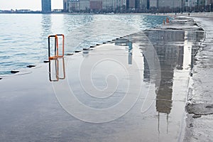 Chicago Skyline Reflected on the Lakefront Trail along Lake Michigan