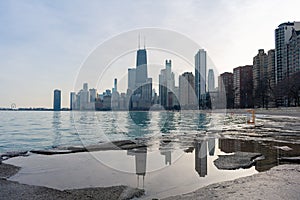 Chicago Skyline Reflected on the Lakefront Trail with Lake Michigan and Ice