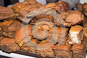 Chicharron dish generally consisting of fried pork belly or fried pork rinds. Picture taken on a market in Arequipa, Peru