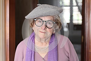 Chick senior lady wearing eyeglasses