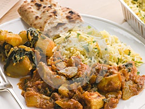 Chicken Bhoona, Sag Aloo And Pilau Rice