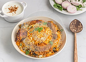 Chicken Biryani with Raita and Onion - One Pot Rice and Chicken Dish