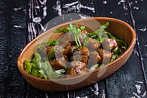 Chicken bites in a rustic bowl