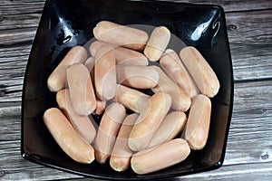 chicken boiled hot dog, dish consisting of a grilled, steamed, or boiled sausage served in the slit of a partially sliced bun,