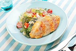 Chicken Breast with pasta salad and broccolini photo