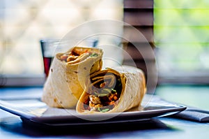 Chicken breast with piri piri sauce and lettuce in a chili tortilla wrap