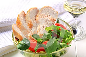 Chicken breast with salad greens