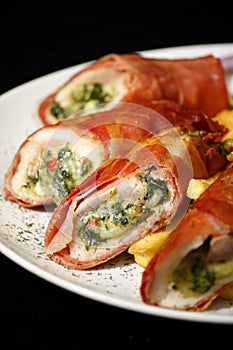 Chicken breast stuffed with broccoli and cheese photo