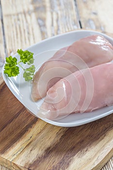 Chicken Breast on wooden Board