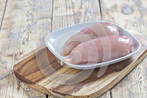 Chicken Breast on wooden Board