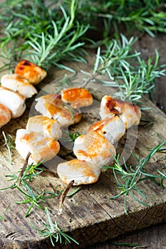 Chicken brochette kebab grilled bbq meat on rosemary branch