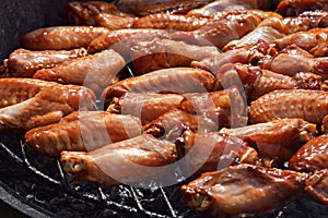 Chicken buffalo wings cooked on smoke grill