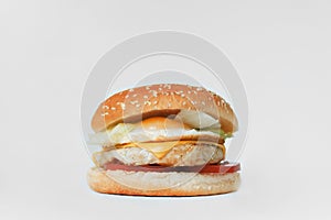 Chicken burger with egg and cheese on a white background